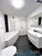BARRIEREFREI ! Modernisierte 3,5 Zimmer Wohnung mit 2 Balkonen und Garage in PF-Sonnenhof - Badezimmer