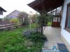 Doppelhaushälfte mit wunderschönem großzügigem Garten in der schönsten Seenlandschaft im Allgäu - Seitenansicht Terrasse