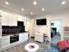 Stilvoll eingerichtetes 2-Zimmer-Apartment in zentraler Lage von Stuttgart Bad Cannstatt! - Wohnzimmer mit Küche