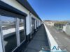2,5-Zimmer-Penthouse mit umlaufender 43 m² Terrasse – wohnen über den Dächern der City! - Terrasse mi Stadtblick