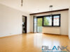 Attraktive 3-Zimmer-Eckwohnung mit zwei Balkonen und Feldblick - Wohnzimmer